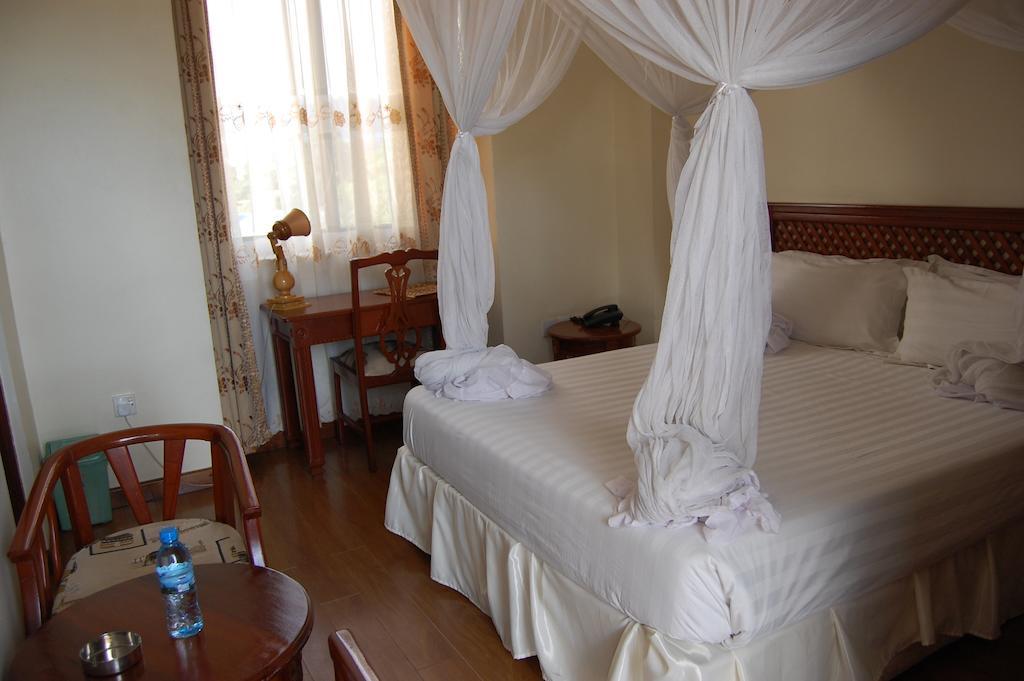 Arusha Tourist Inn Hotel Стая снимка