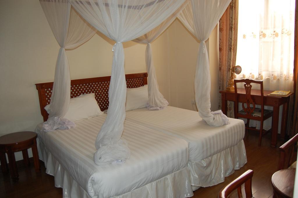 Arusha Tourist Inn Hotel Стая снимка